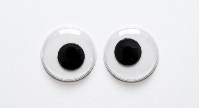 Funny googly eyes on white background