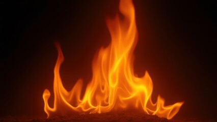 Fototapeta premium vibrant orange and yellow flames against deep black void long exposure dramatic fire texture for cinematic advertising background