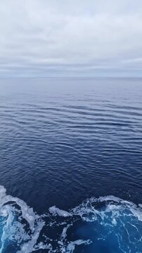 open ocean with calm blue waters, horizon views, and peaceful maritime travel scenery.