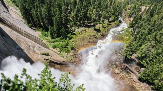 Breathtaking footage captured at the top of Nevada Fall, where the Merced River rushes across smooth granite before plunging into the canyon below