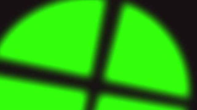 Vibrant Neon Green Circle Split into Four Quadrants Abstract Motion Background.