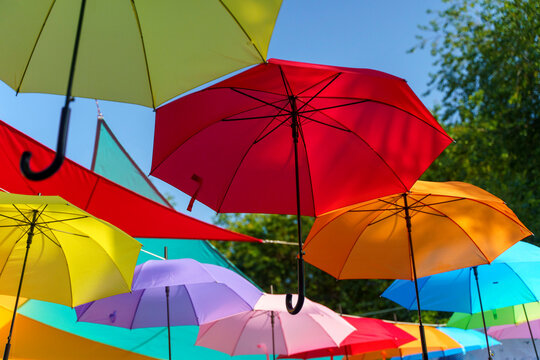 Vibrant display of colorful hanging umbrellas
