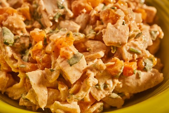 A bowl of Coronation Chicken. The classic British salad.