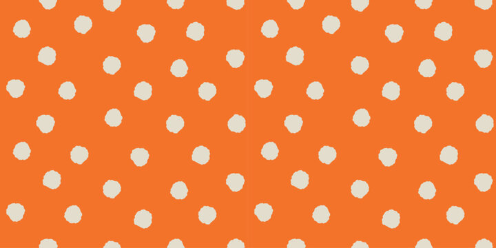 Seamless polka dot pattern with irregular cream circles scattered across vibrant orange background creating playful retro style perfect for fabric wallpaper packaging stationery and digital design
