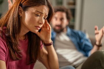 Fototapeta premium Woman feeling sad during a couple argument at home