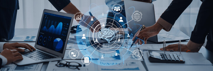 Business Team Analyzing Data with Technology, Mind Mapping, and Digital Interfaces in Modern Office...
