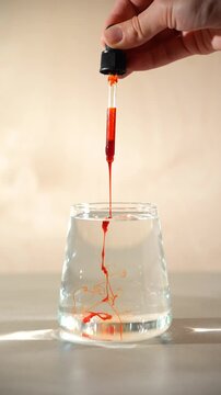 add a liquid form of astaxanthin to a glass of water
