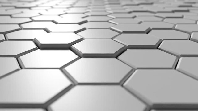 A repeating pattern of white hexagonal tiles with soft lighting