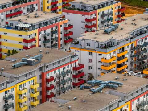 Aerial view of modern apartment buildings with colorful balconies and flat roofs in Brno, South Moravian Region, Czechia.