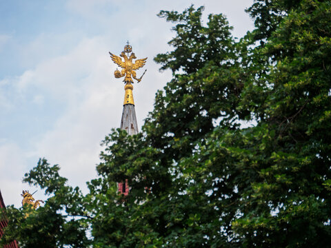 Kremlin Tower with Golden Eagle Amidst Green Trees