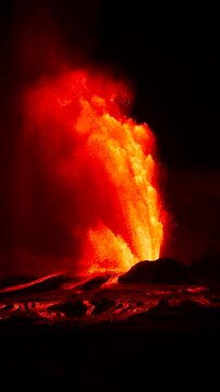 Real time video of lava fountains erupting from Kīlauea Volcano at night in Halemaʻumaʻu Crater, Hawaii Big Island, United States.