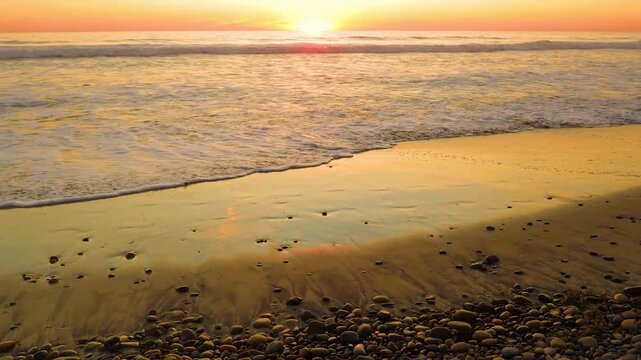 Colorful Sunset Over The Waves of Grandview Surf Beach, Encinitas, California, USA