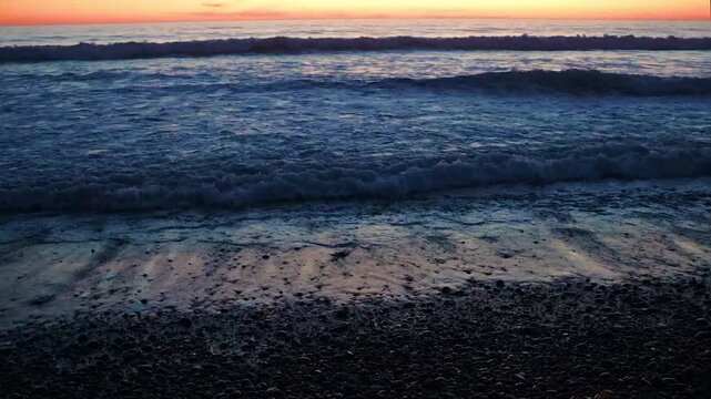 Colorful Sunset Over Rocky Shoreline of Grandview Surf Beach, Encinitas, California, USA