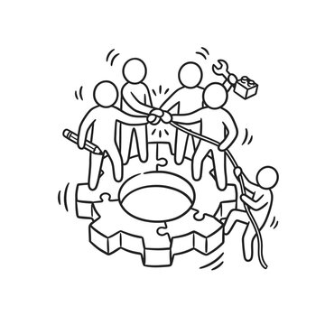 People working together on gear.