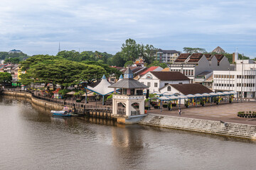 Fototapeta premium September 7, 2023: Scenery of Kuching Waterfront, which spread across 900 meters along the southern bank of the Sarawak River in Borneo, Malaysia. It is the most iconic and popular place in Kuching.