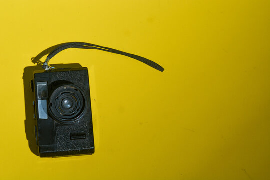 June 9, 2026, Retro Film Camera Isolated on Bright Yellow Background, Wonosobo, Indonesia