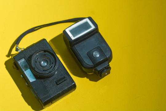 June 9, 2026, Retro Film Camera Isolated on Bright Yellow Background, Wonosobo, Indonesia