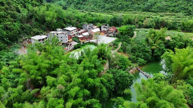 Quiet Mountain Village with Old Mud-Brick Houses and Newer Brick Homes, Karst Hills, Aerial
