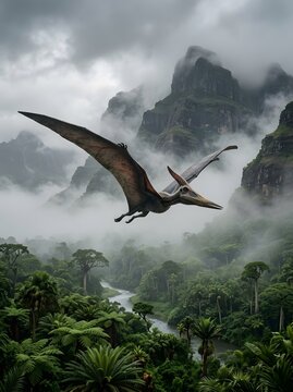 Ancient pterodactyl flying over tropical river and jungle mountain landscape during misty morning day.