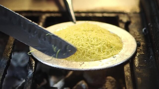 Making kunefe in a kitchen at a market