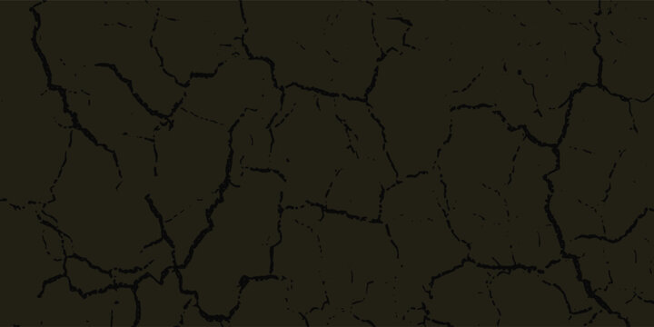 Cracked earth texture background in dark brown color