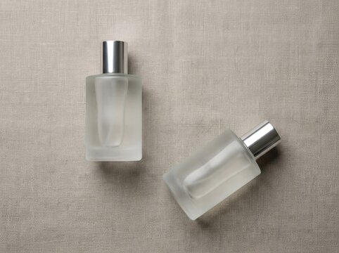 Perfume Bottle Mockup, Frosted Glass & Silver Cap Product Presentation, Cosmetic Branding Concept