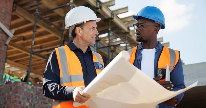 Planning, blueprint and architect with people on construction site for documents, renovation and team. Contractor report, engineering feedback and project development with men at building inspection