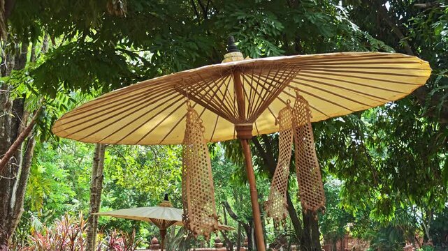Antique umbrellas are made of wood and fabric.