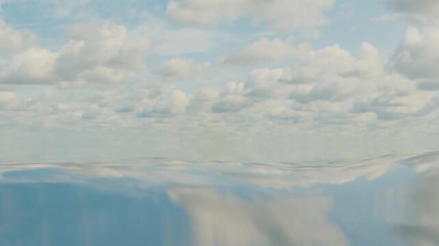 Beautiful blue sky with clouds and calm ocean horizon background