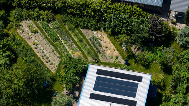 Aerial view of modern eco-friendly houses, Ecovillage in Almere
