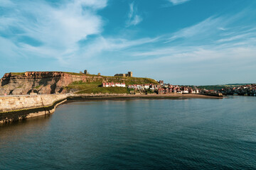 Naklejka premium coastal pier with sea view of Whitby, England