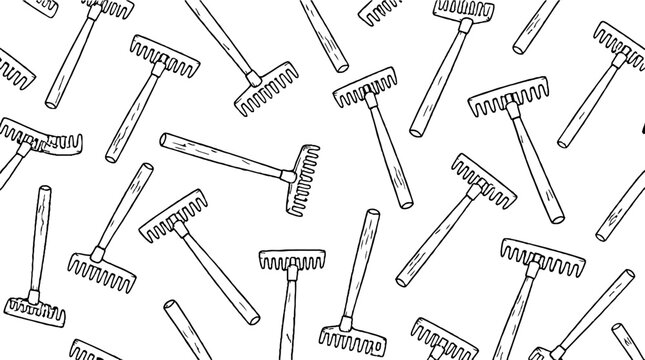 Scattered garden rakes in various orientations and styles.