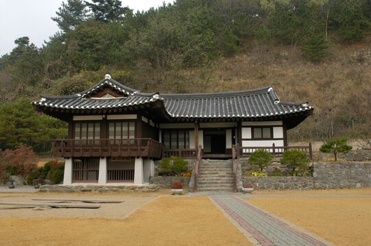 Traditional Han San Ramie Weaving Craft in South Korea. A master craftsman weaving traditional Han San Ramie fabric on a wooden loom in a historic Korean house in Seocheon, South Korea. Intangible cul