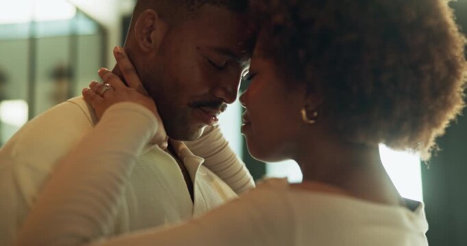 Dance, moment or love with happy couple in kitchen of home together for bonding or security. Affection, eyes closed and forehead touch with black people in apartment for connection, morning or trust