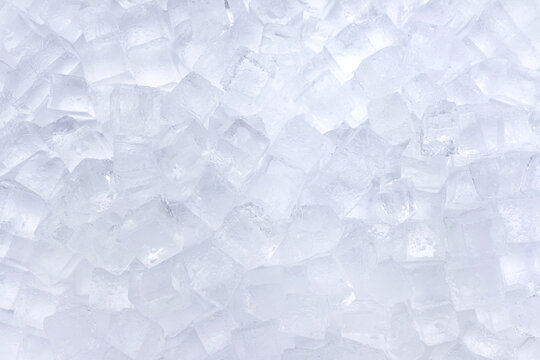 Versatile blue and white ice cubes texture background with cool refreshing feel and clear transparent details for elegant print media or digital web design projects.