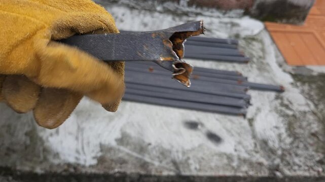 Holding Rusted Metal Tubular Section Detail Close Up