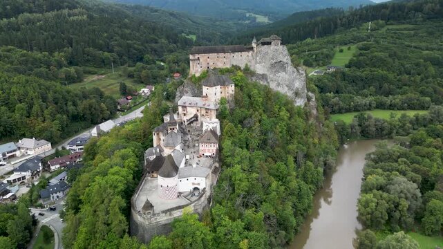 Aerial View of Orava Castle Surrounded by Forests and Hills