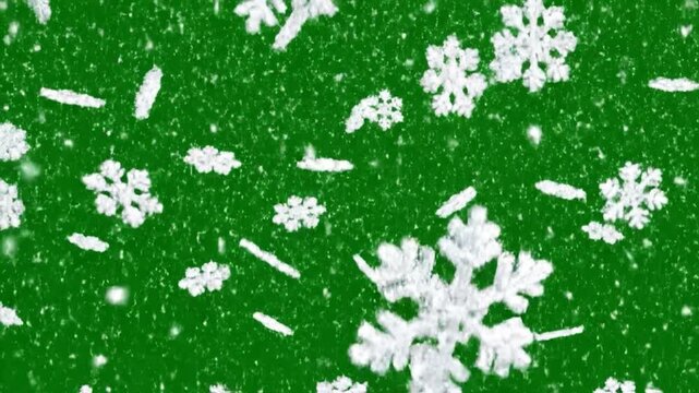 White snowflakes falling on a solid green background