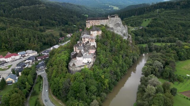 Aerial Drone View of Orava Castle with River, Hills and Countryside in Slovakia