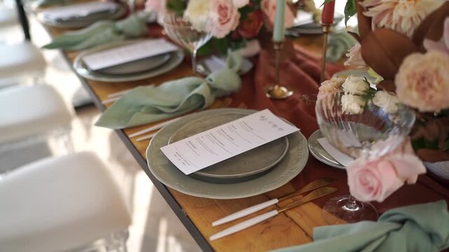 Sophisticated rustic table setting with ceramic plates and printed menus