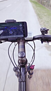 Person POV travel with bicycle and GPS navigation