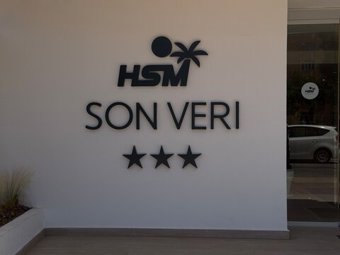 Mallorca, spain, june 20, 2026 hsm son veri hotel entrance facade featuring its official logo, name, and three star rating on a clean white wall