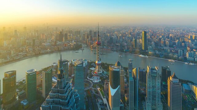 Timelapse of Shanghai city and Huangpu river at sunset, China.