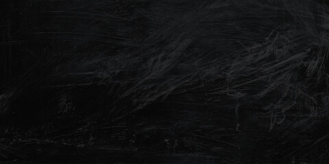 Dark scratched blackboard background with white chalk marks texture © Daiyan