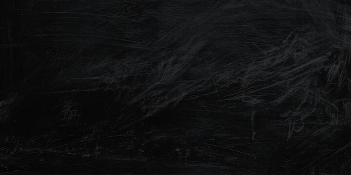 Dark scratched blackboard background with white chalk marks texture