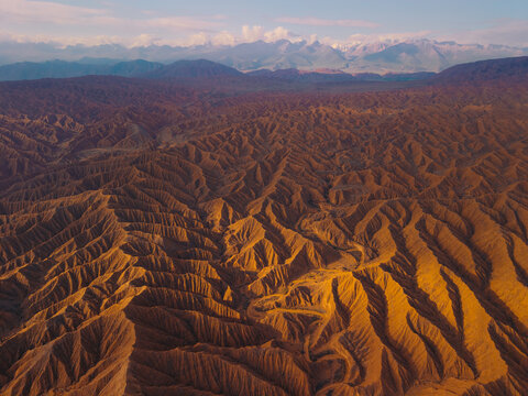 Aerial view of the intricate ridges and eroded formations of Ak Say Canyon, also known as the Valley of Forgotten Rivers, in Ak Say, Issyk-Kul Region, Kyrgyzstan.