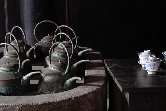 Traditional Chinese Copper Tea Sets and Old Teahouses