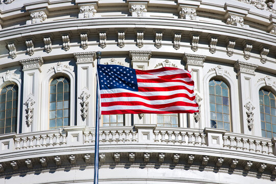 Capitol Building flying the American Flag