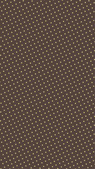 Fototapeta premium Brown background with yellow polka dots in a repeating pattern 