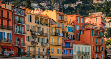 Obraz premium Seaside promenade with colorful restaurants along the Mediterranean Sea in Villefranche sur Mer Old Town, Villefranche-sur-Mer, France